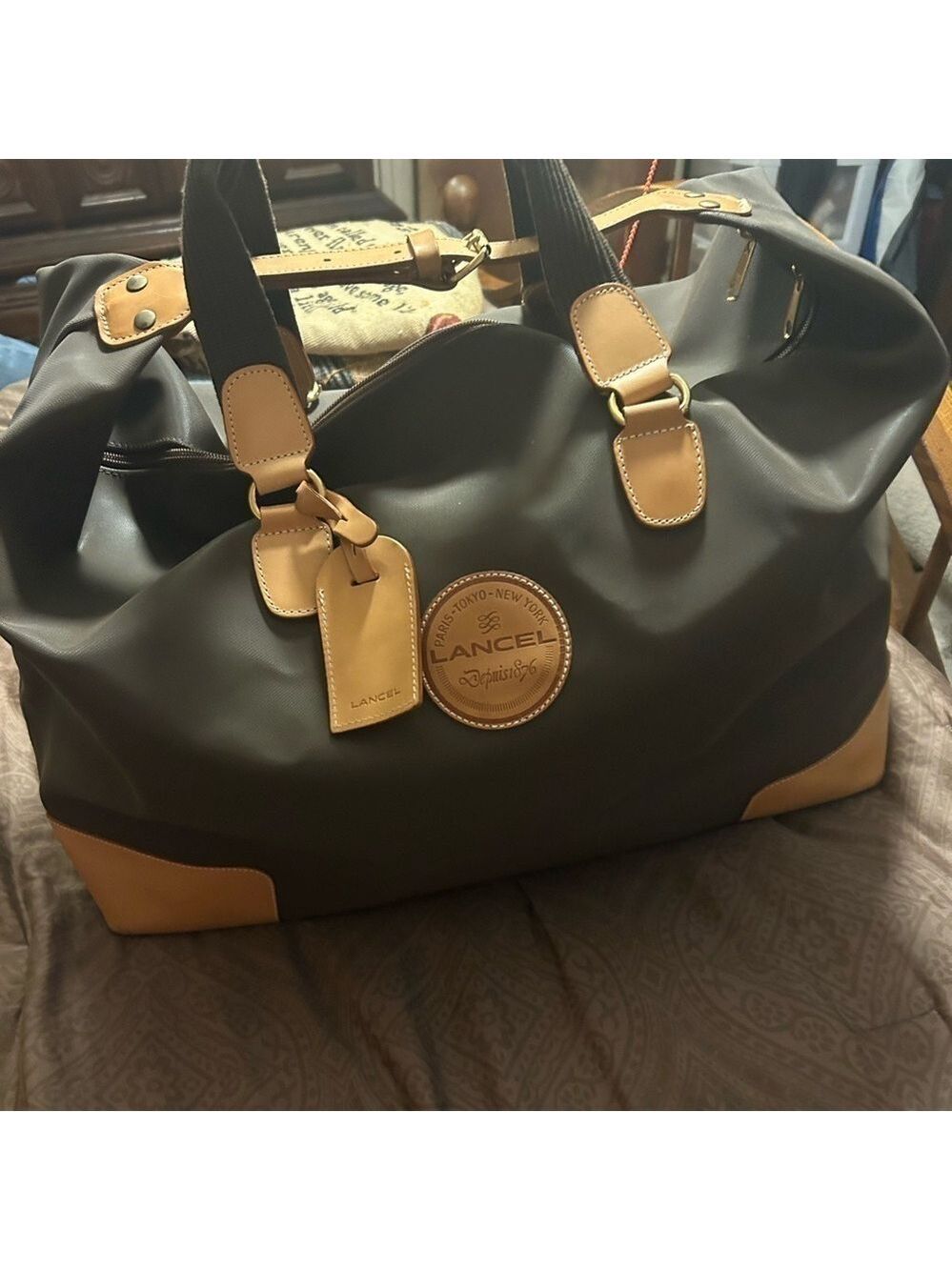 Lancel canvas luggage bag